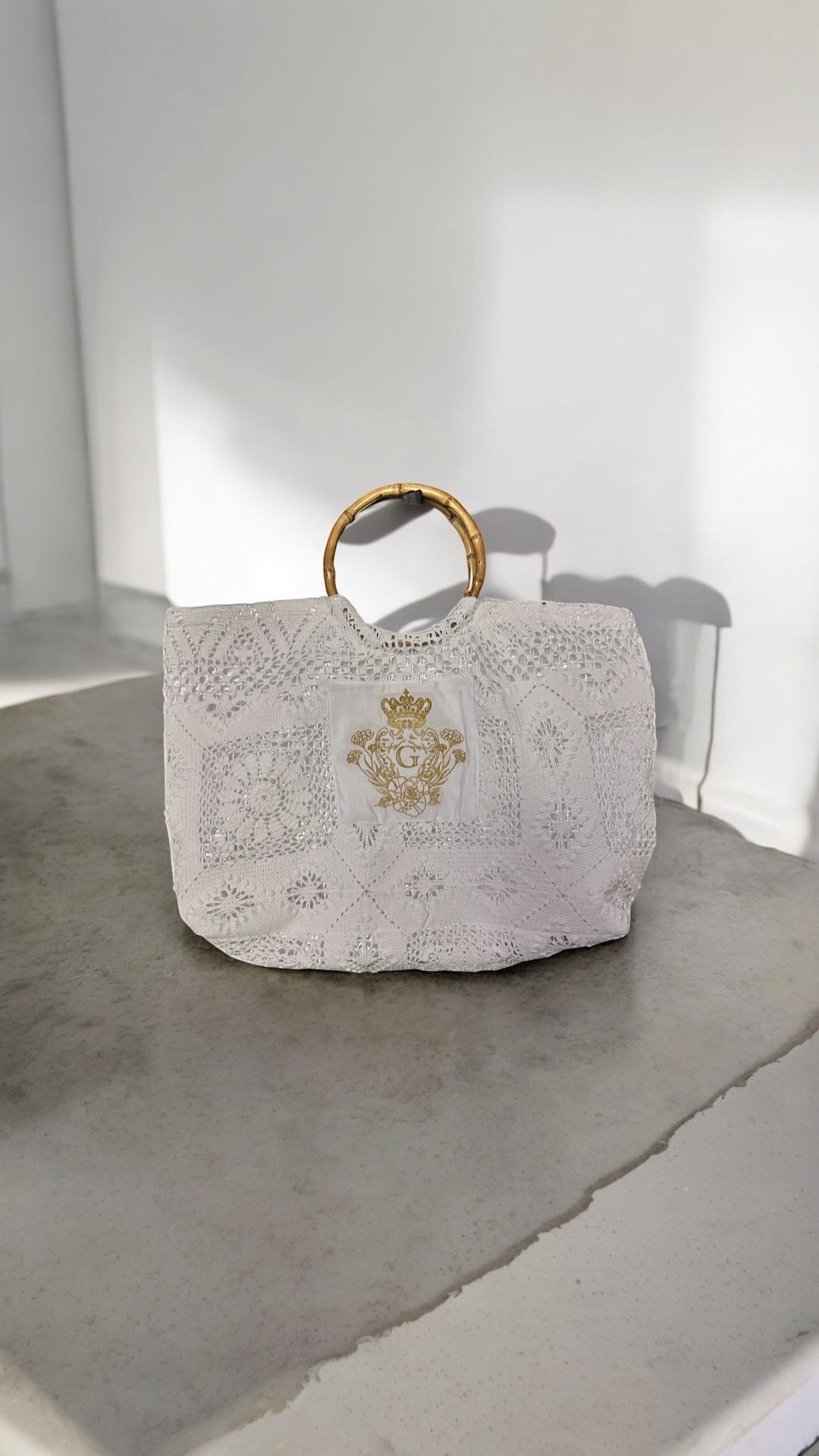 Sac Marie-Anne blanc doublure transparente plastifiée et son logo doré