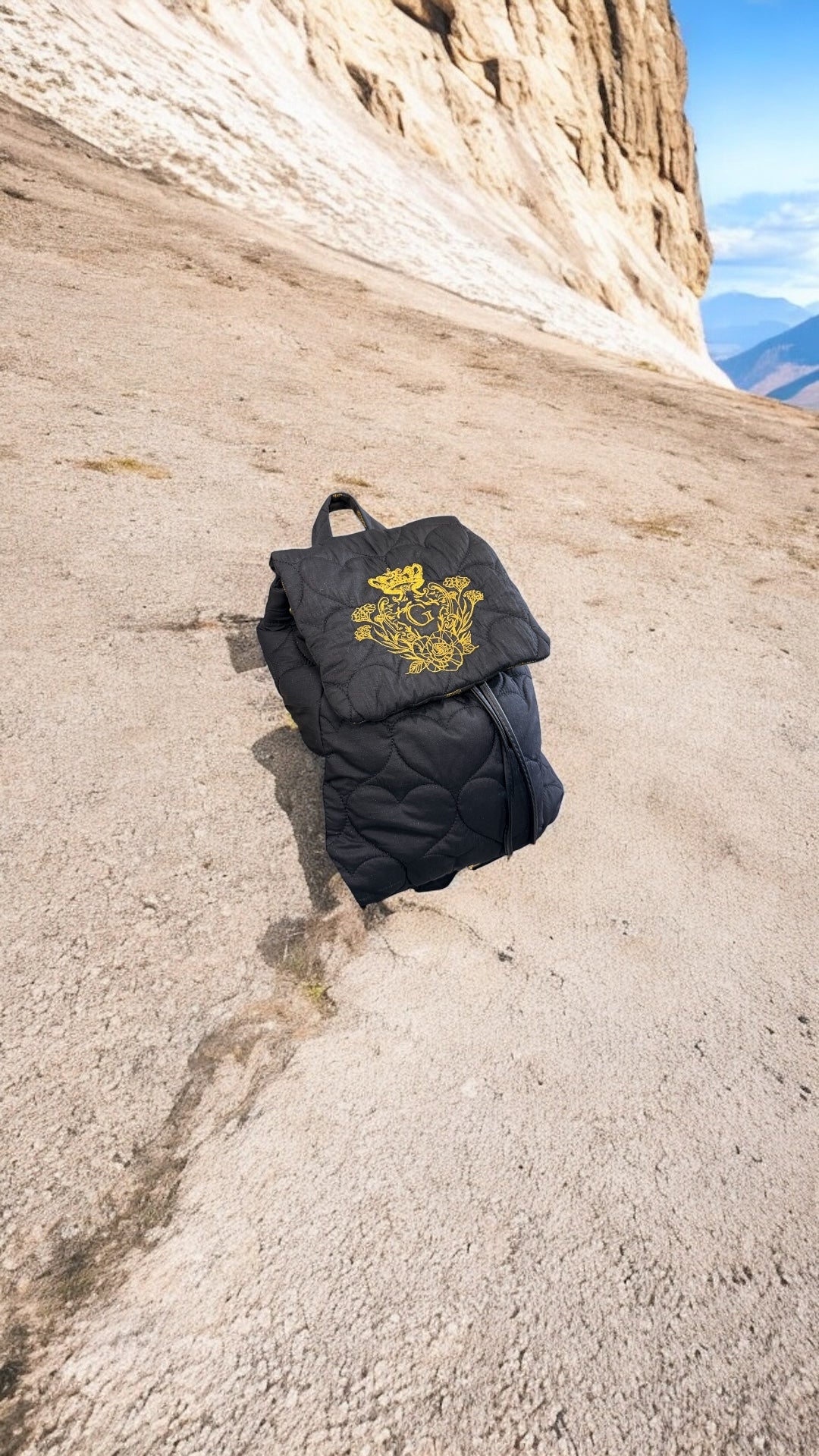 Sac à dos noir matelassé pailleté