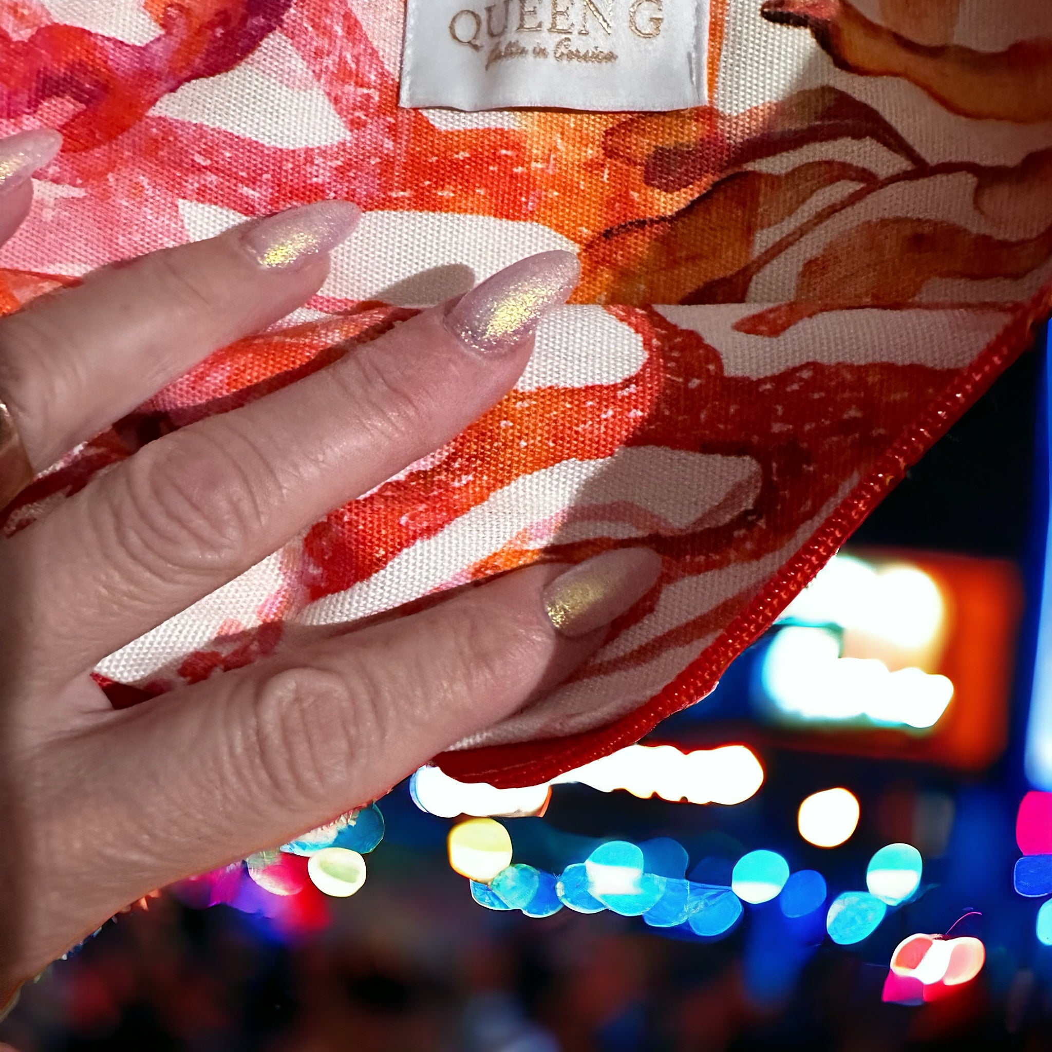 Pochette XL en éponge Bonie en coton Orange intérieur en cretonne enduite thème coraux et son logo mauve et rouge