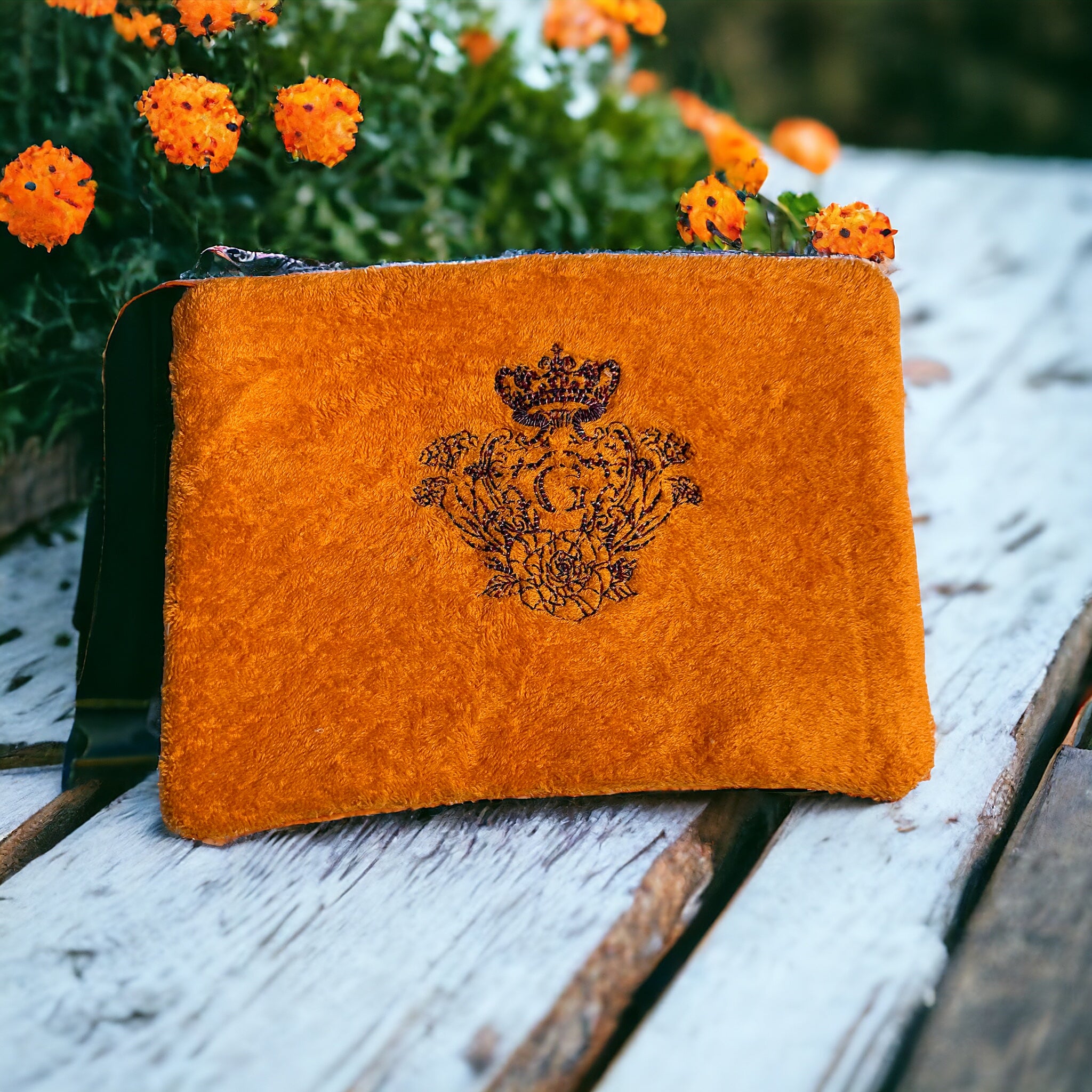 Pochette XL en éponge Bonie en coton Orange intérieur en cretonne enduite thème coraux et son logo mauve et rouge