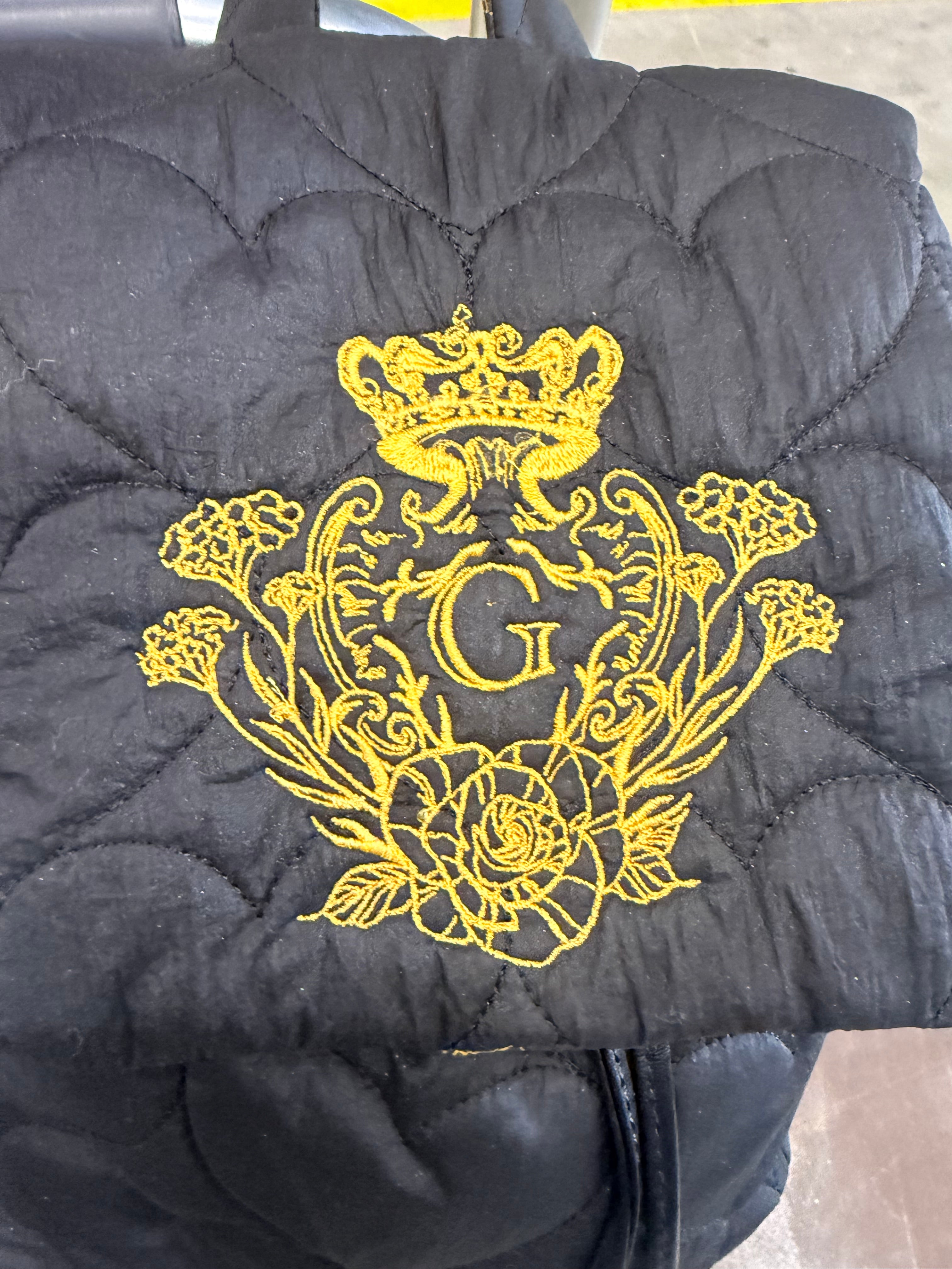 Sac à dos noir matelassé pailleté